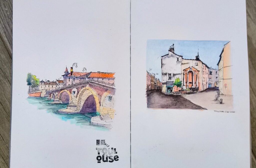 A Pleinly A4 portrait sketchbook showing a 2 page Pen and Watercolour Sketch spread of Toulouse by artist Patty Edge