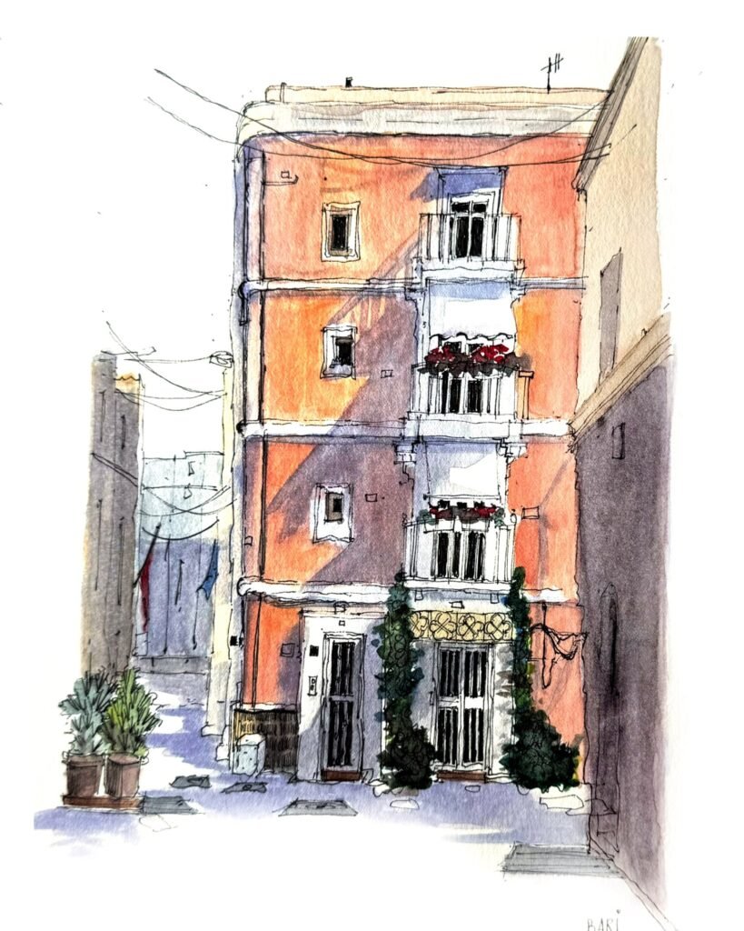 Pen-and-watercolour sketch by Patty Edge of a narrow orange apartment building with balconies and street-level shops.