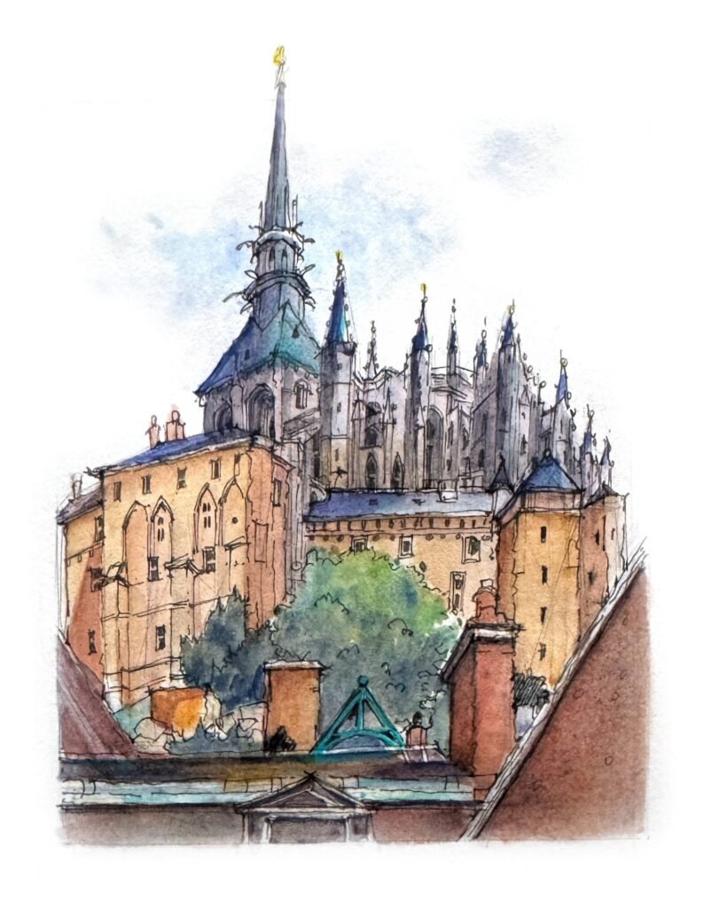 Pen and watercolour sketch of the Abbey of Mont-Saint-Michel rising above warm buildingsh with and dark Gothis spires
