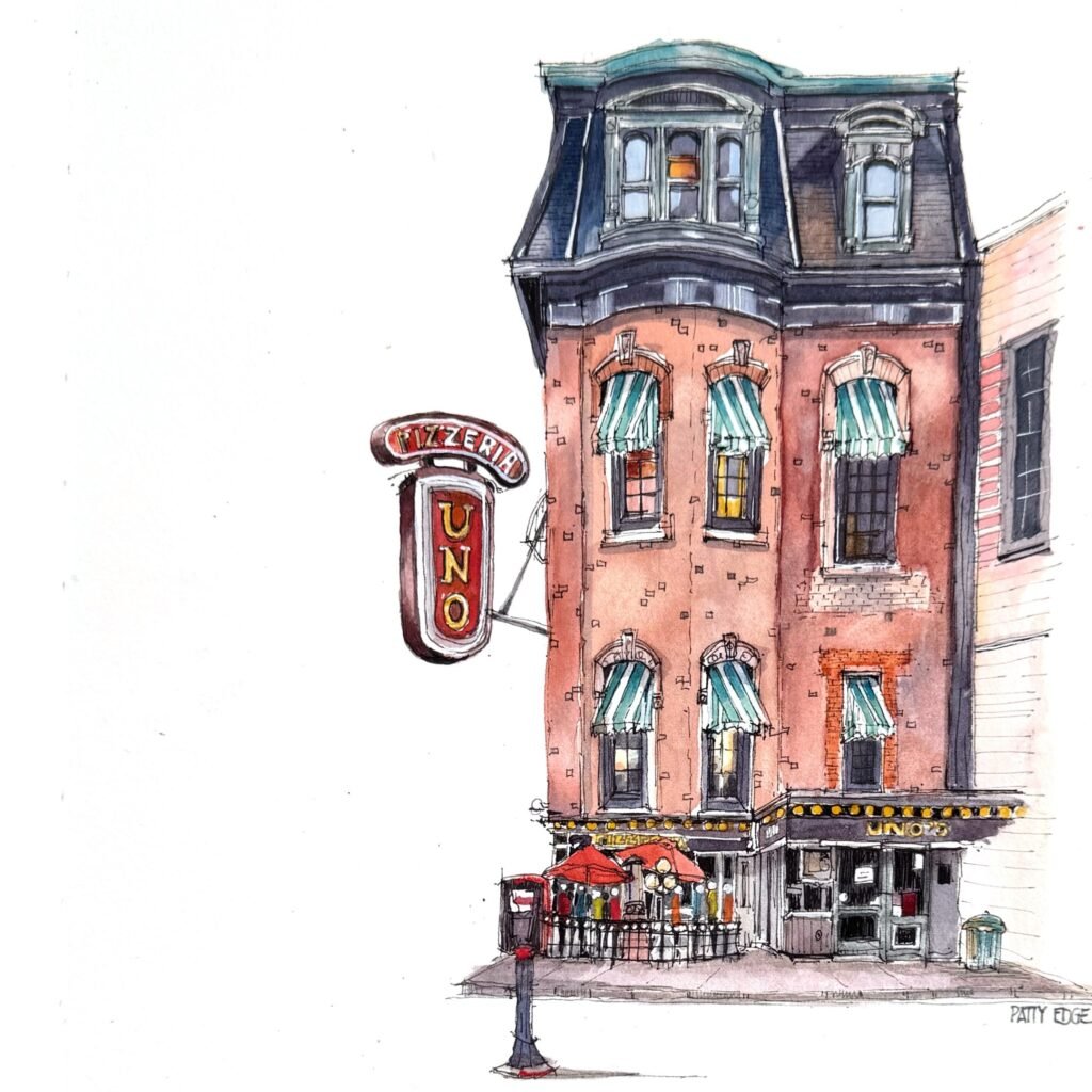 Pen-and-watercolour sketch by Patty Edge of a slender red corner building with a dark mansard roof and shopfront.